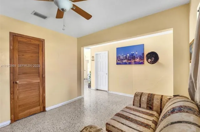 a bedroom with a bed and furniture