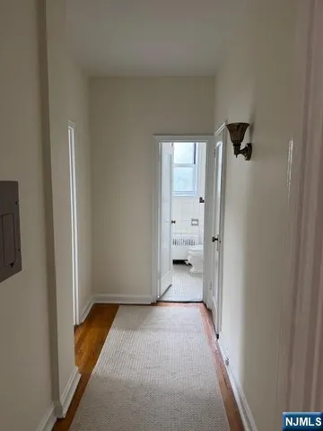 a view of a room with a wardrobe space