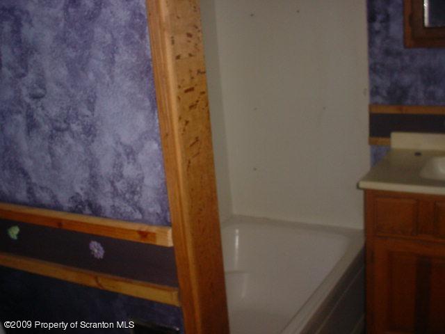 Rr Springville, PA 18844 - Photo 11 of 11 a bathroom with a bathtub