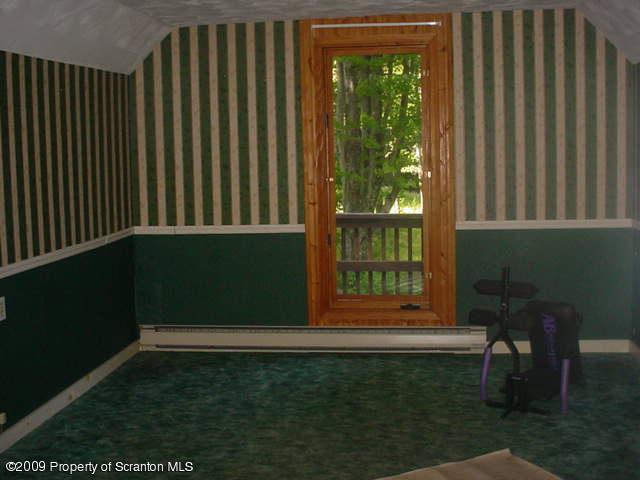 Rr Springville, PA 18844 - Photo 4 of 11 a backyard of a house with table and chairs