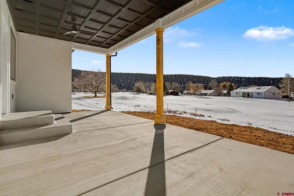 a view of a backyard of a house
