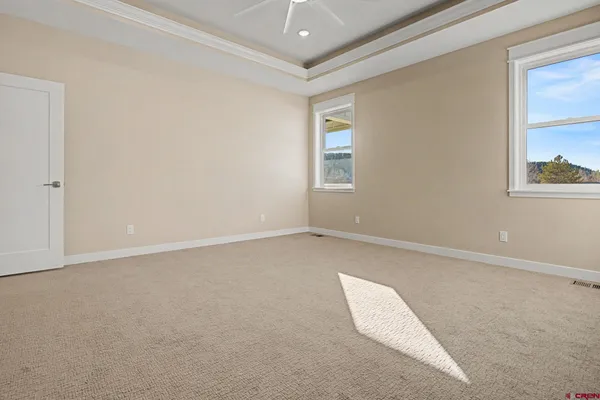 an empty room with windows