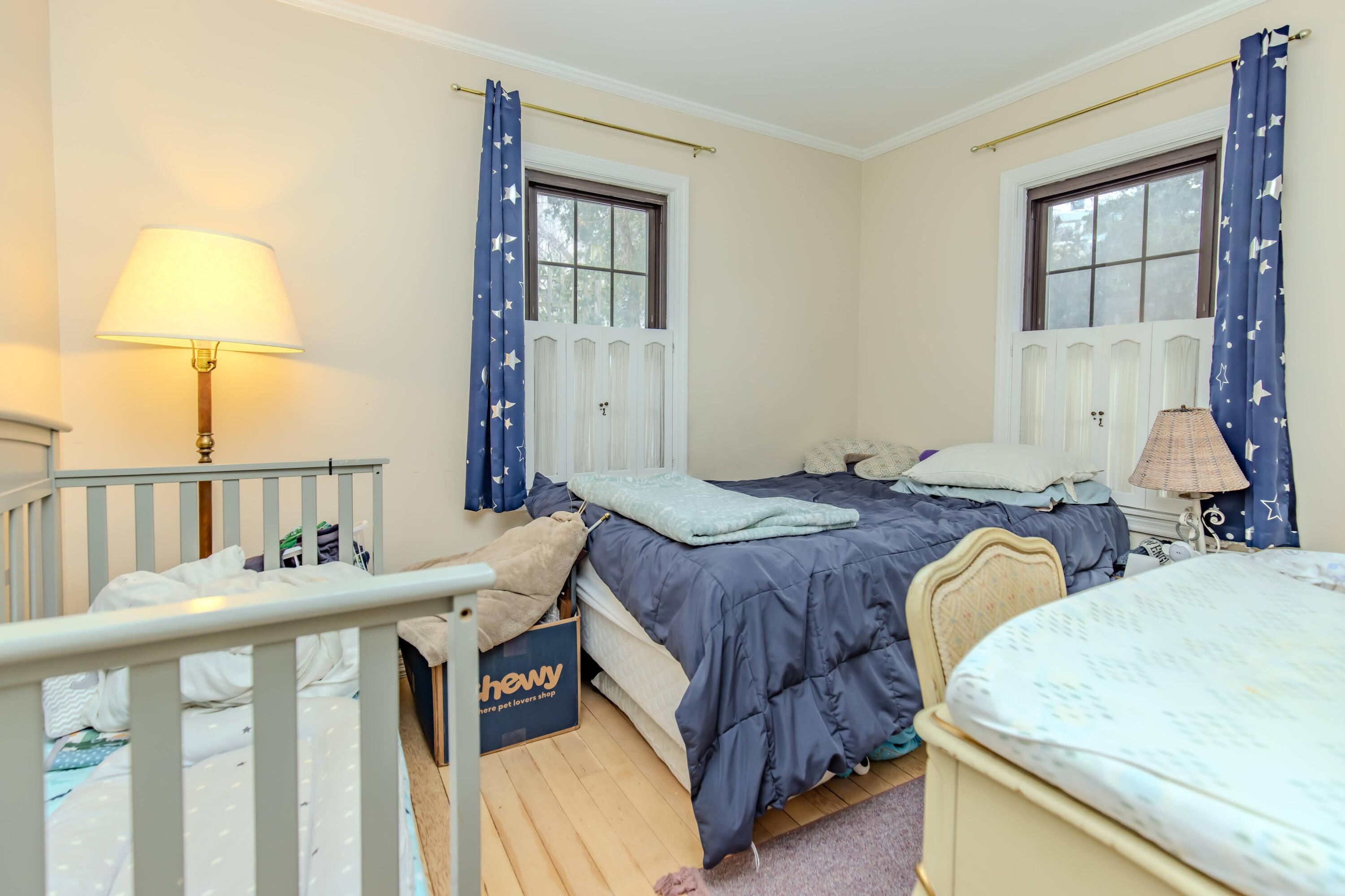 30 Sunset Trail Portage, IN 46368 - Photo 27 of 47 a bedroom with a bed and a window