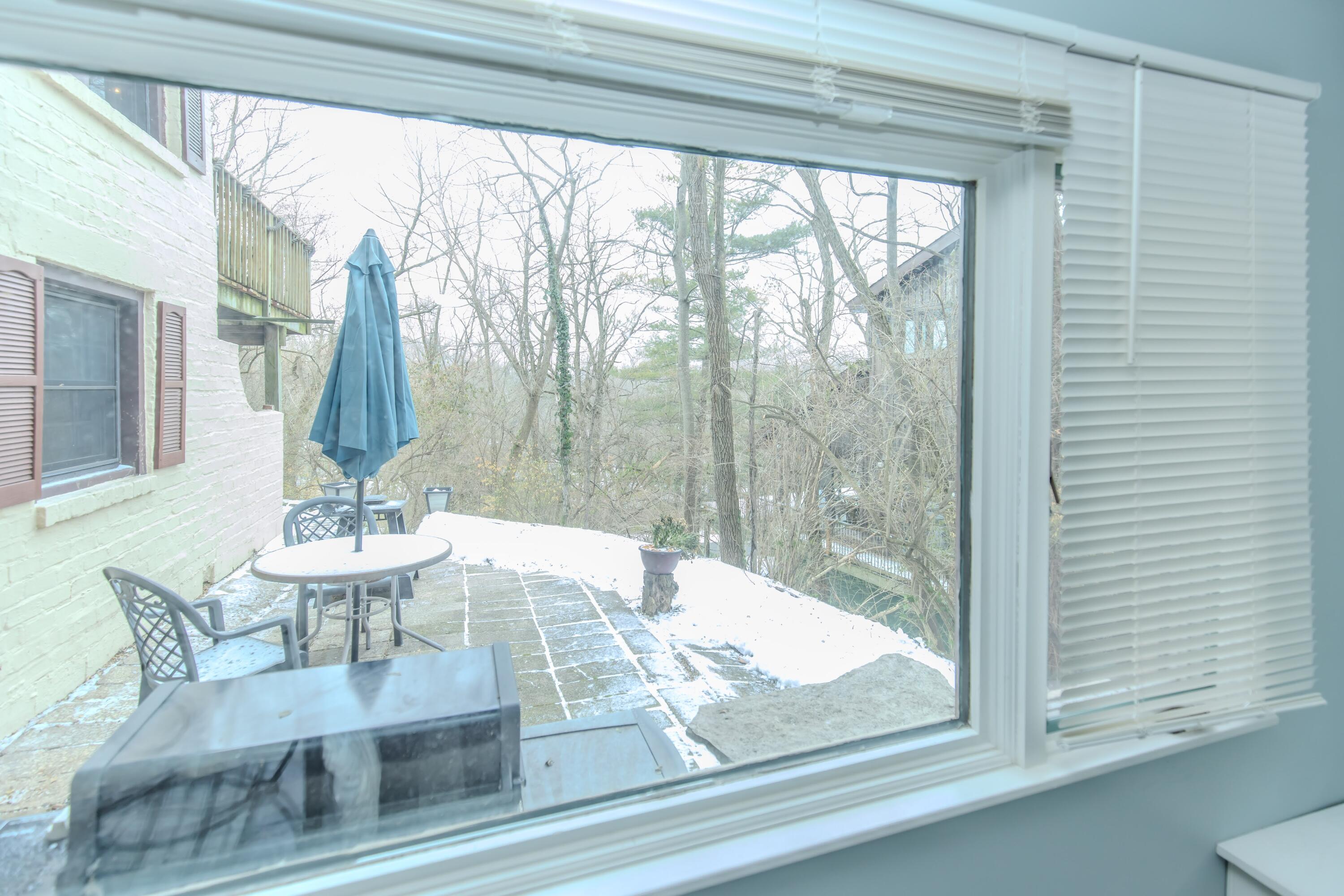 30 Sunset Trail Portage, IN 46368 - Photo 34 of 47 a view of a dining room with furniture wooden floor and a table