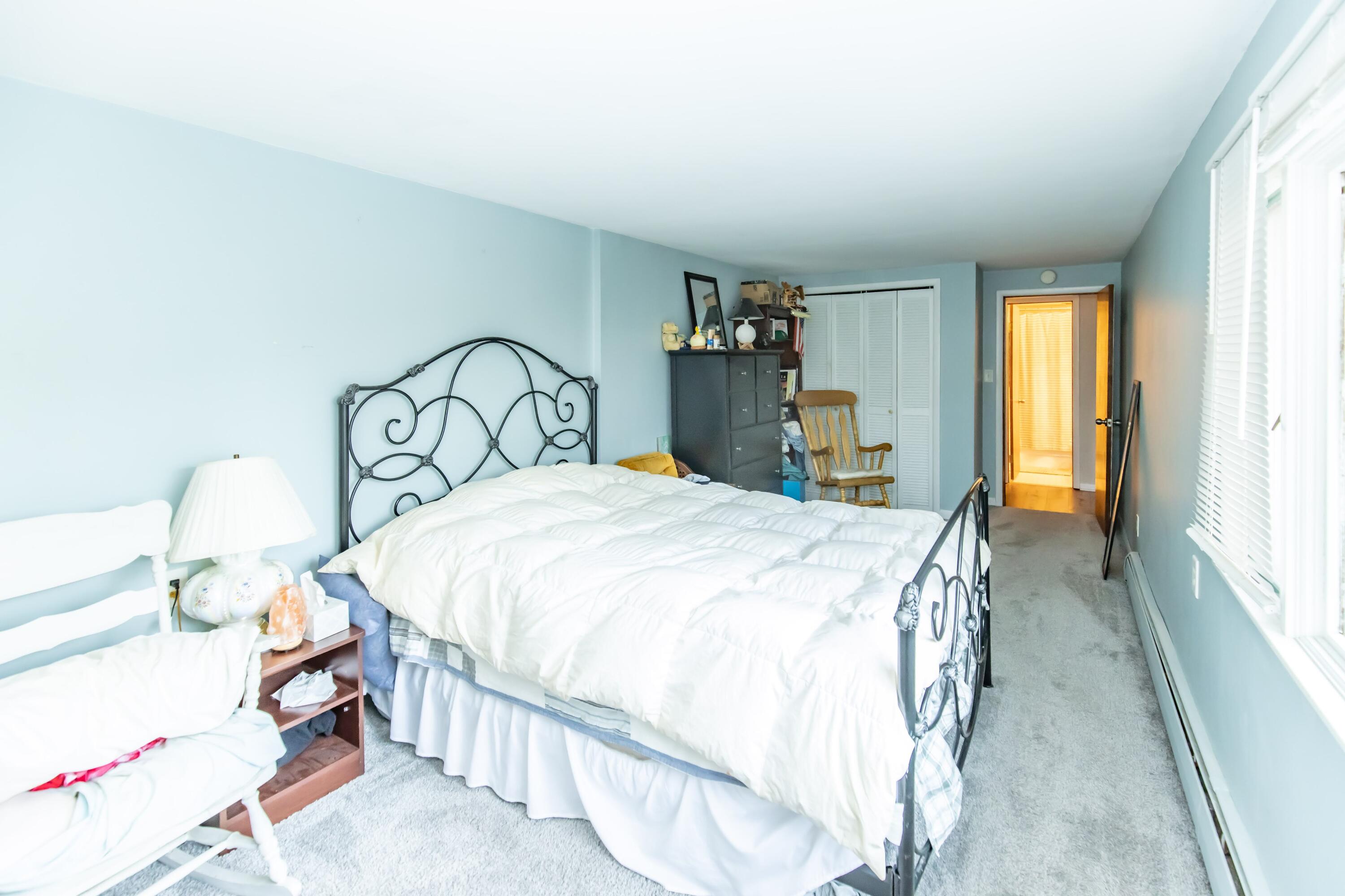 30 Sunset Trail Portage, IN 46368 - Photo 35 of 47 a bedroom with a bed and a large window