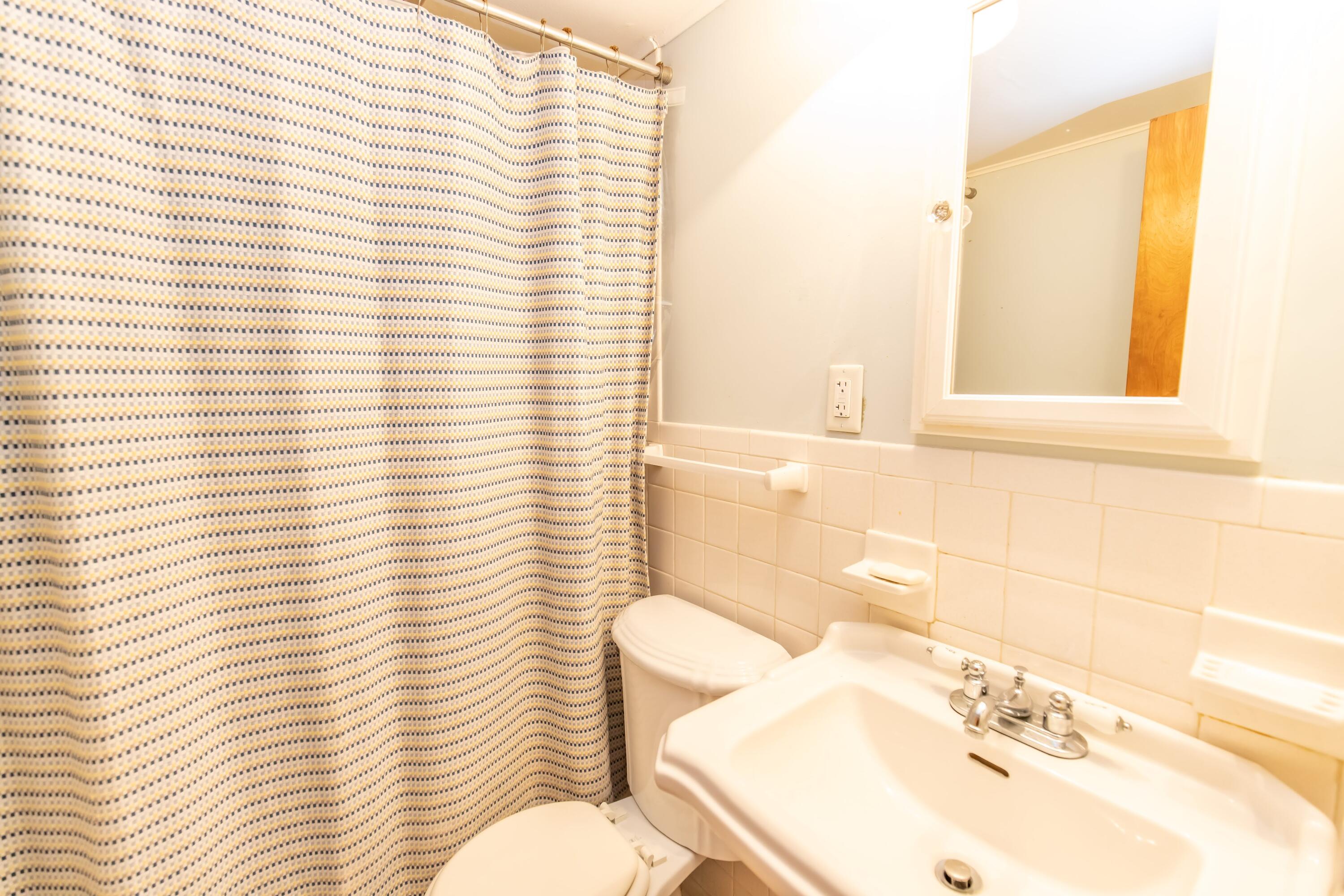 30 Sunset Trail Portage, IN 46368 - Photo 38 of 47 a bathroom with a sink a toilet and tub