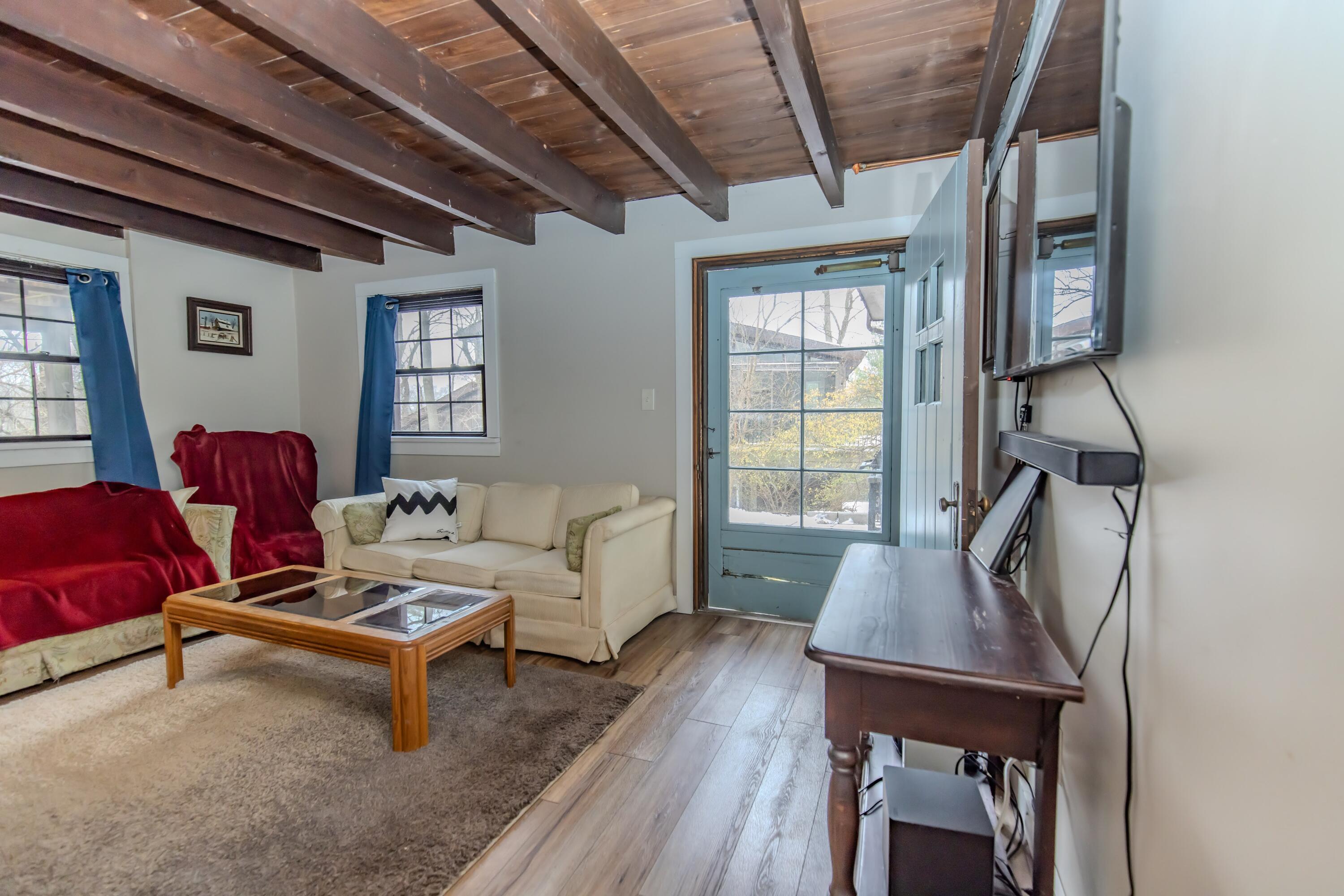 30 Sunset Trail Portage, IN 46368 - Photo 42 of 47 a living room with furniture a window and wooden floor