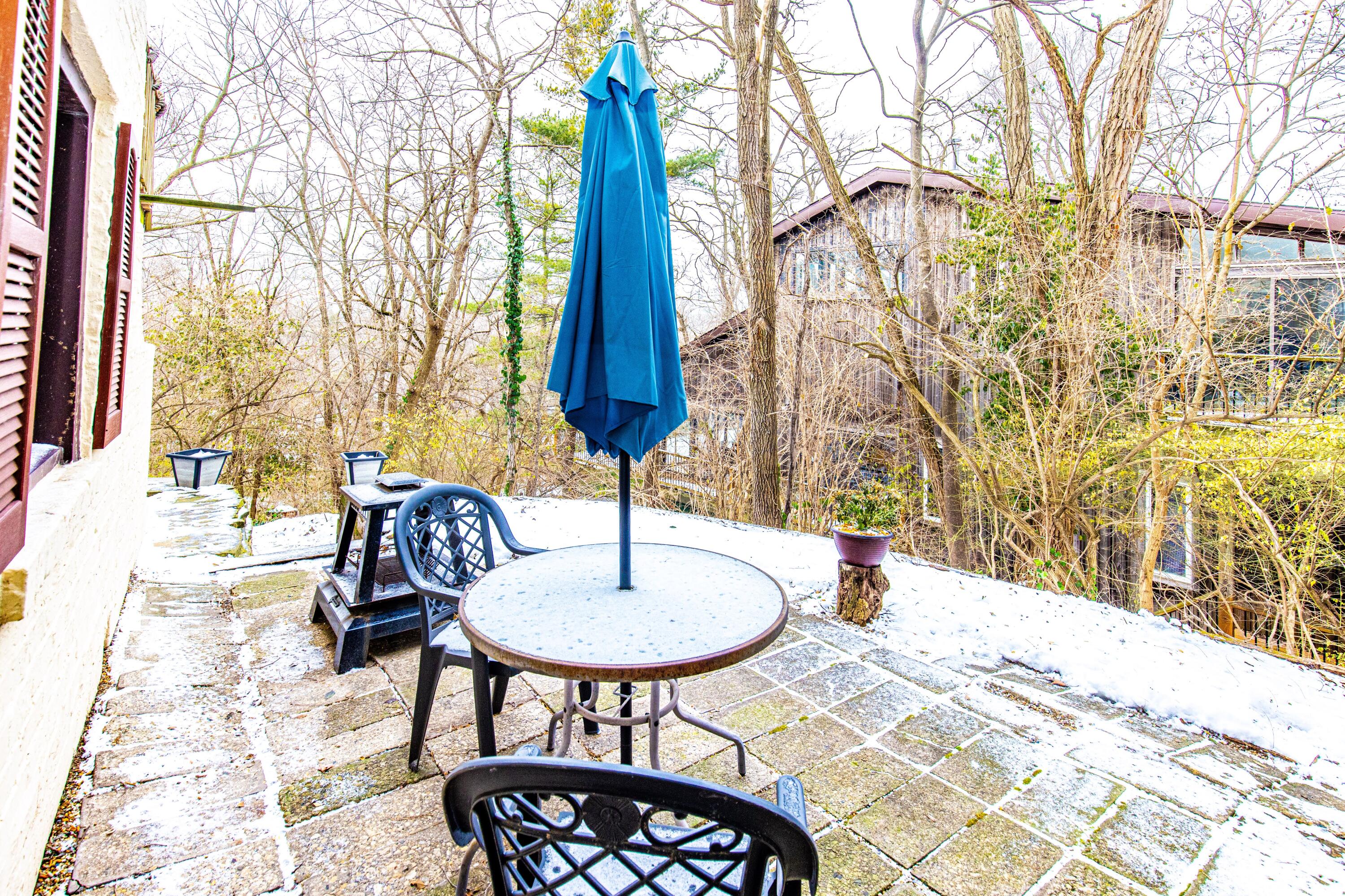 30 Sunset Trail Portage, IN 46368 - Photo 44 of 47 a backyard of a house with table and chairs