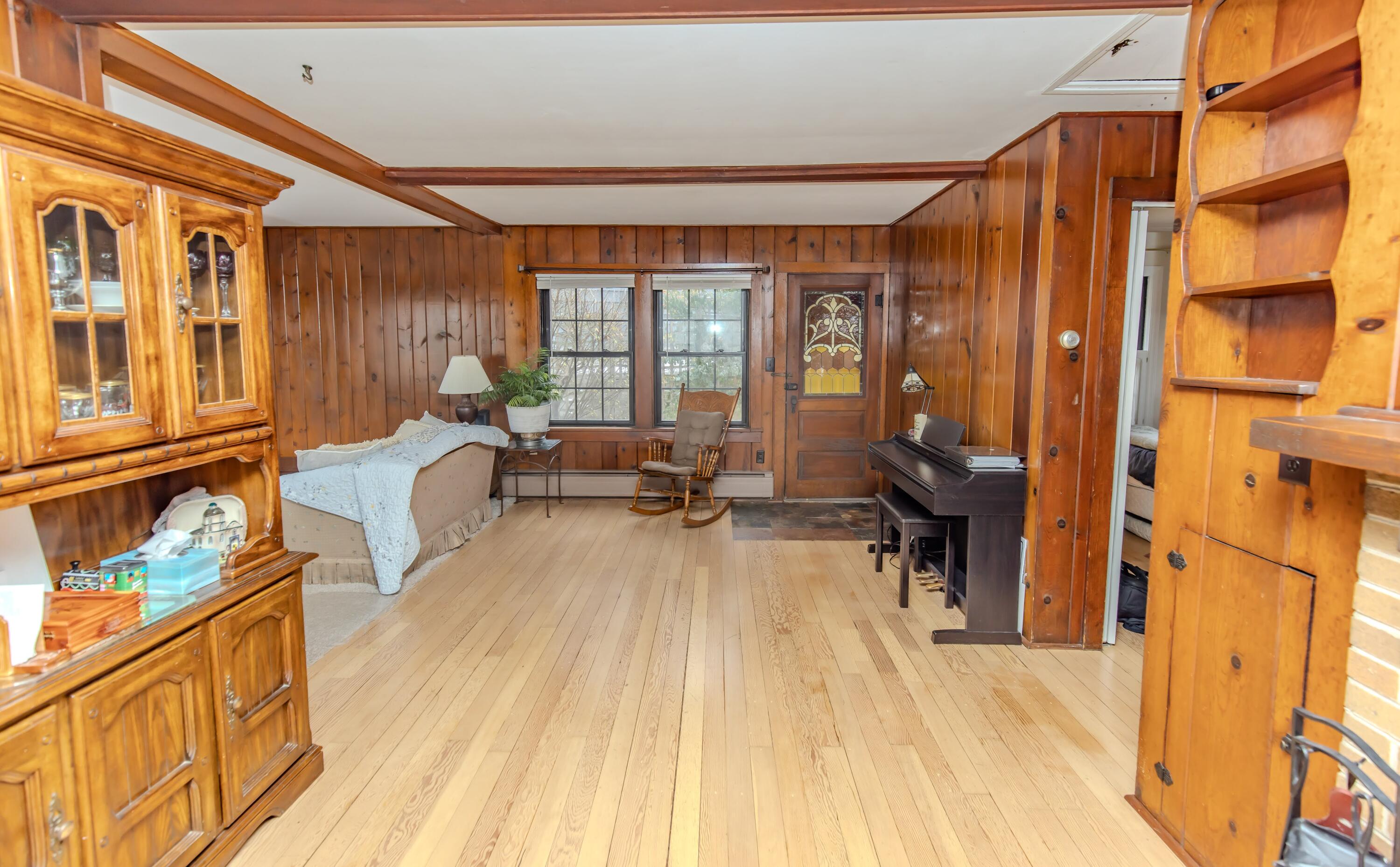 30 Sunset Trail Portage, IN 46368 - Photo 8 of 47 a living room with furniture a large window and rug