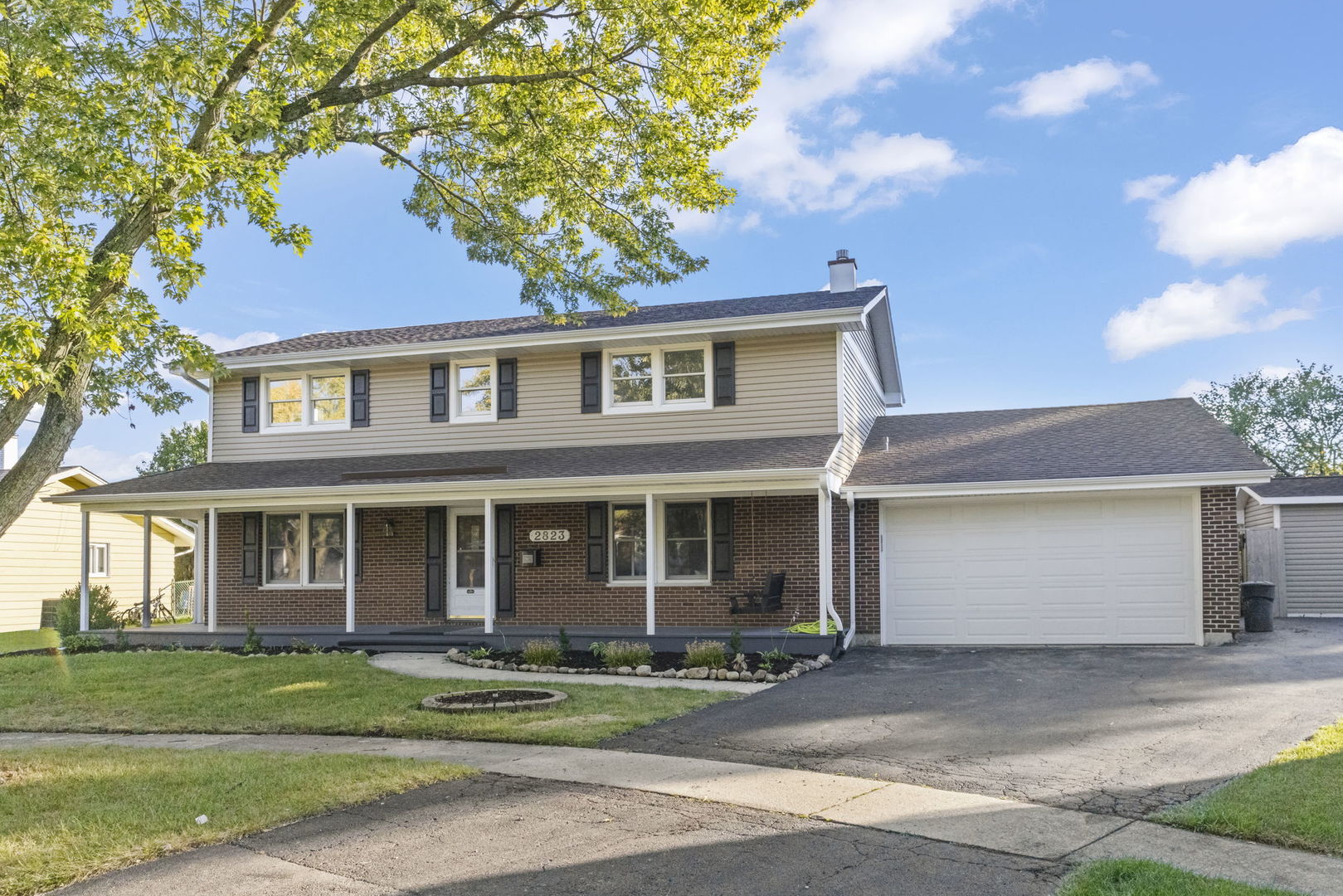 2823 Cooper Court Woodridge, IL 60517 - Photo 1 of 32 front view of a house with a yard