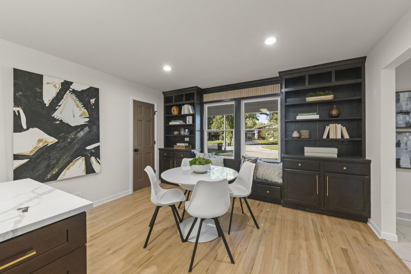 2823 Cooper Court Woodridge, IL 60517 - Photo 13 of 32 a view of a dining room with furniture window and wooden floor