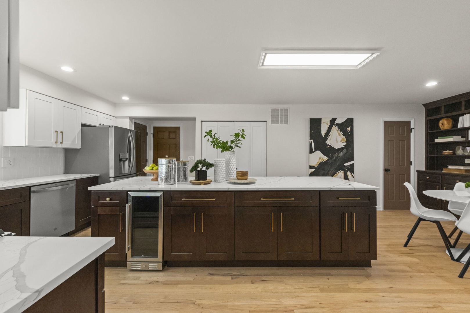 2823 Cooper Court Woodridge, IL 60517 - Photo 15 of 32 a kitchen with a sink cabinets and wooden floor
