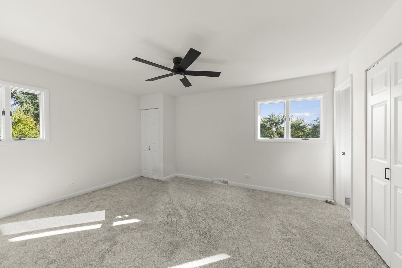 2823 Cooper Court Woodridge, IL 60517 - Photo 20 of 32 a view of an empty room with a window