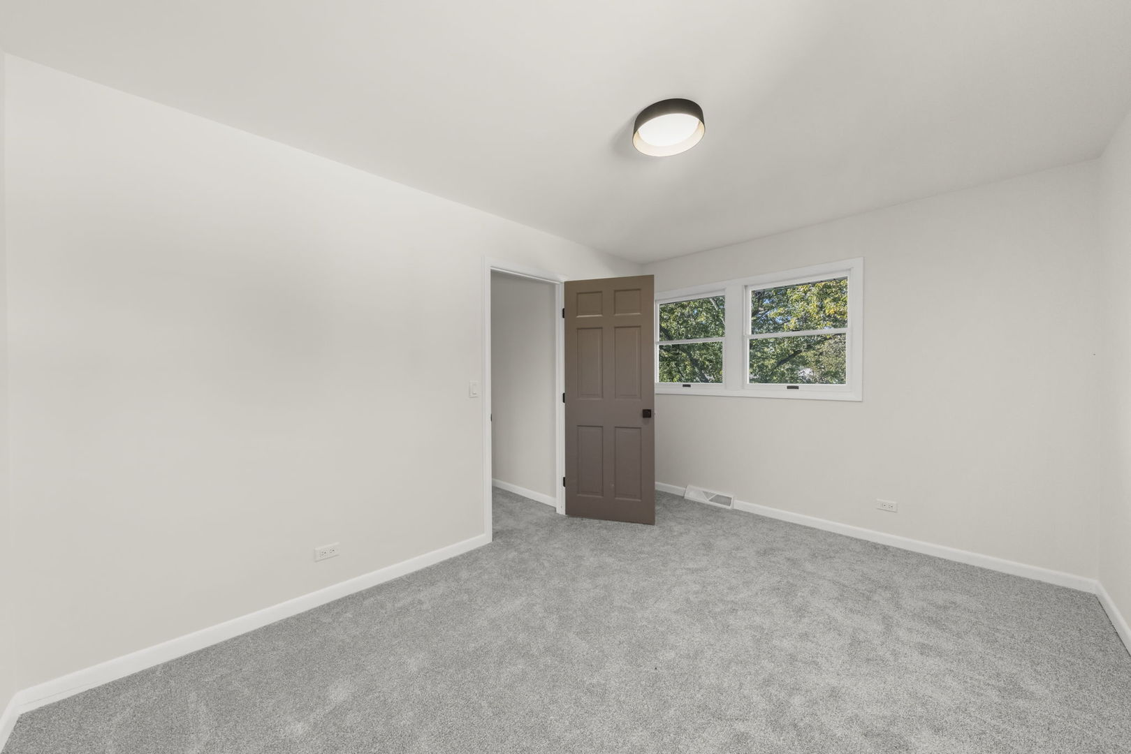 2823 Cooper Court Woodridge, IL 60517 - Photo 24 of 32 an empty room with windows