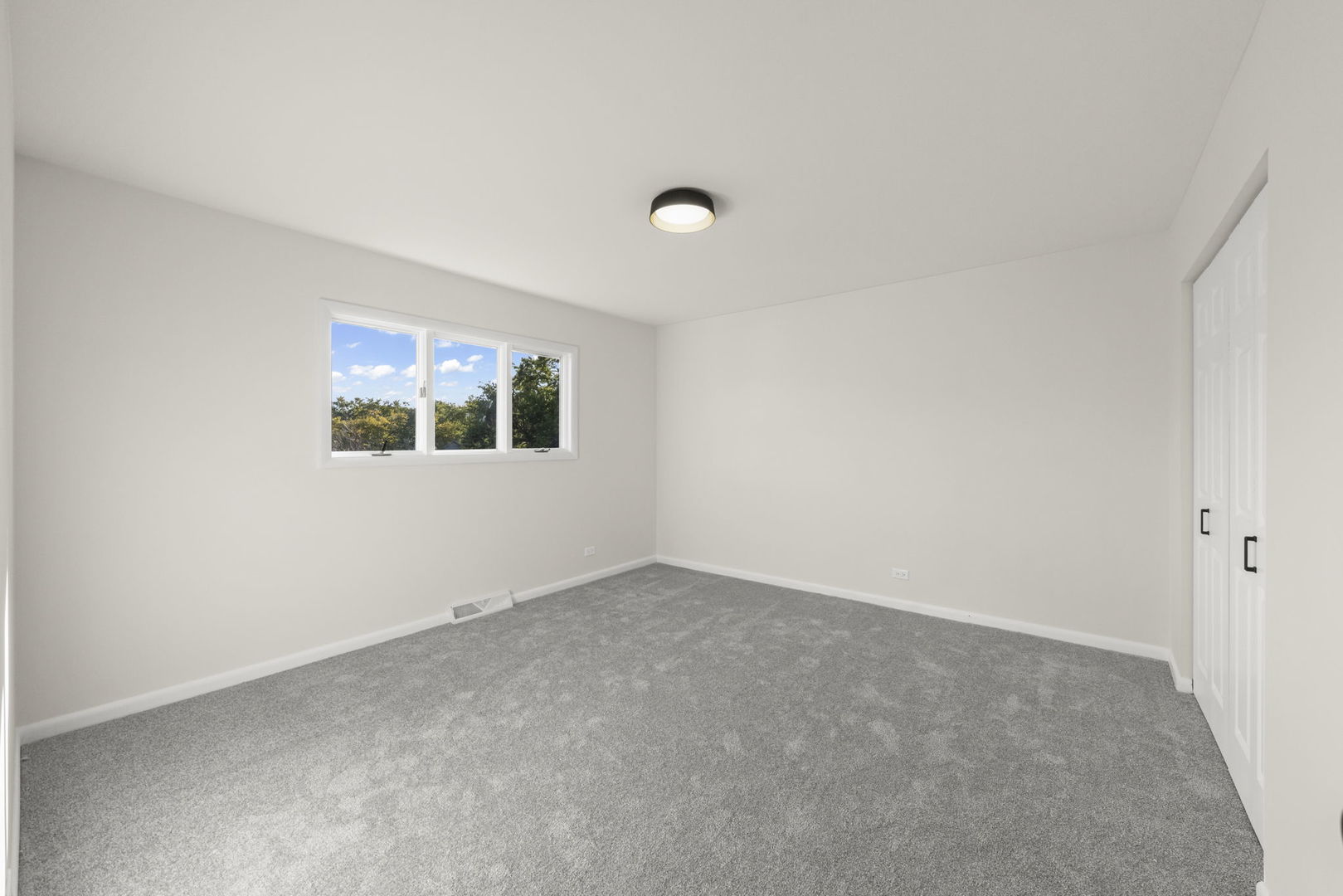 2823 Cooper Court Woodridge, IL 60517 - Photo 26 of 32 an empty room with windows