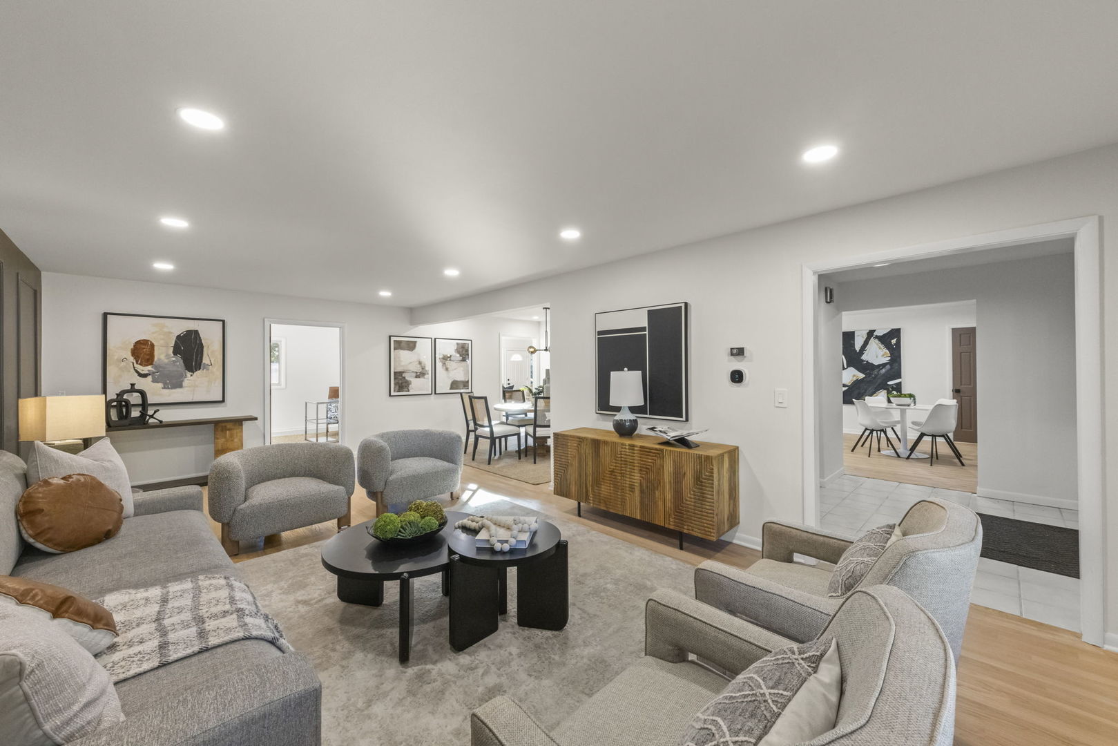 2823 Cooper Court Woodridge, IL 60517 - Photo 4 of 32 a living room with furniture or couch and a flat screen tv