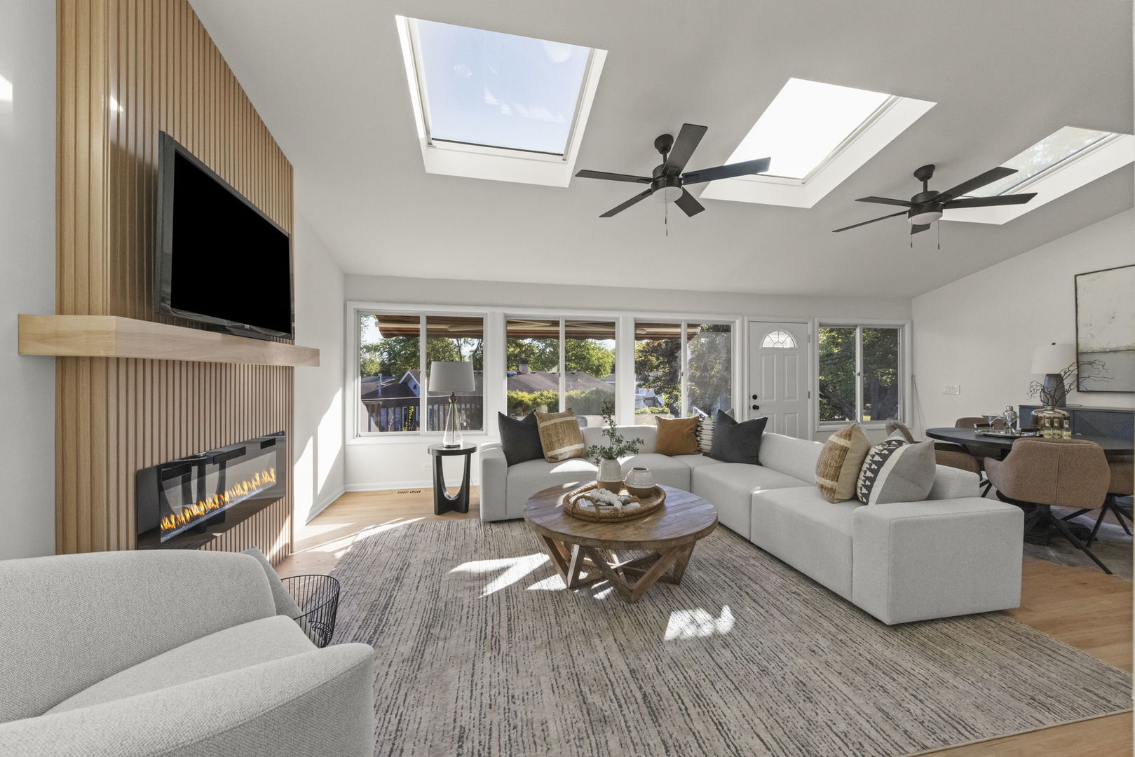 2823 Cooper Court Woodridge, IL 60517 - Photo 8 of 32 a living room with furniture fireplace and flat screen tv