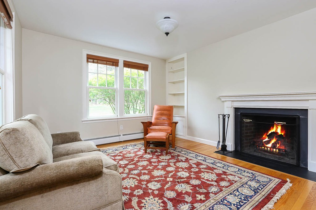 10 Woodside Road Topsfield, MA 01983 - Photo 11 of 30 a living room with furniture and a fireplace