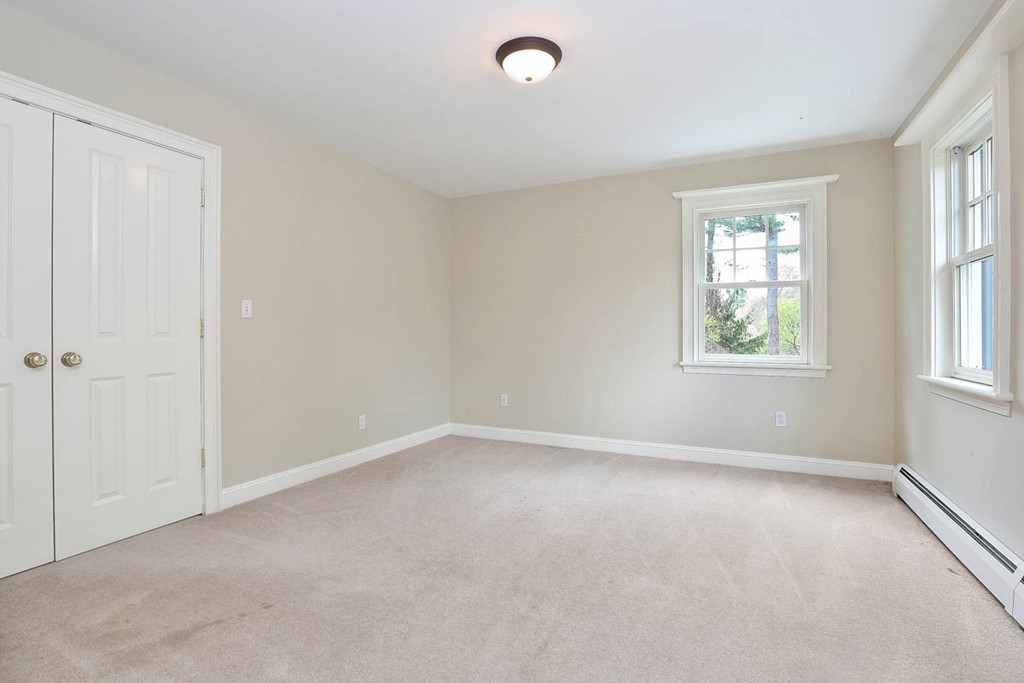 10 Woodside Road Topsfield, MA 01983 - Photo 16 of 30 a view of an empty room with a window