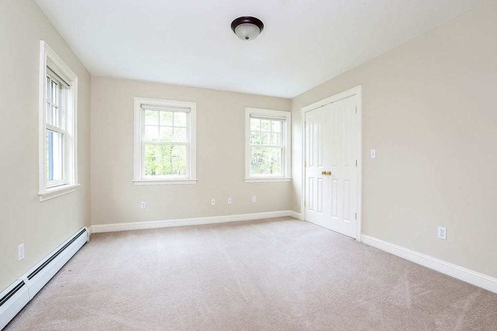 10 Woodside Road Topsfield, MA 01983 - Photo 18 of 30 an empty room with windows