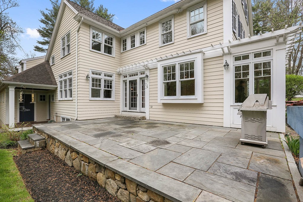 10 Woodside Road Topsfield, MA 01983 - Photo 25 of 30 a view of a house with wooden fence
