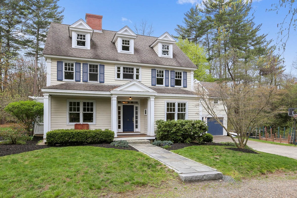 10 Woodside Road Topsfield, MA 01983 - Photo 28 of 30 a front view of a house with a yard
