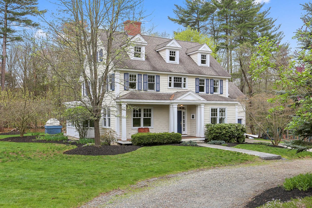 10 Woodside Road Topsfield, MA 01983 - Photo 30 of 30 a view of a house with a yard and potted plants