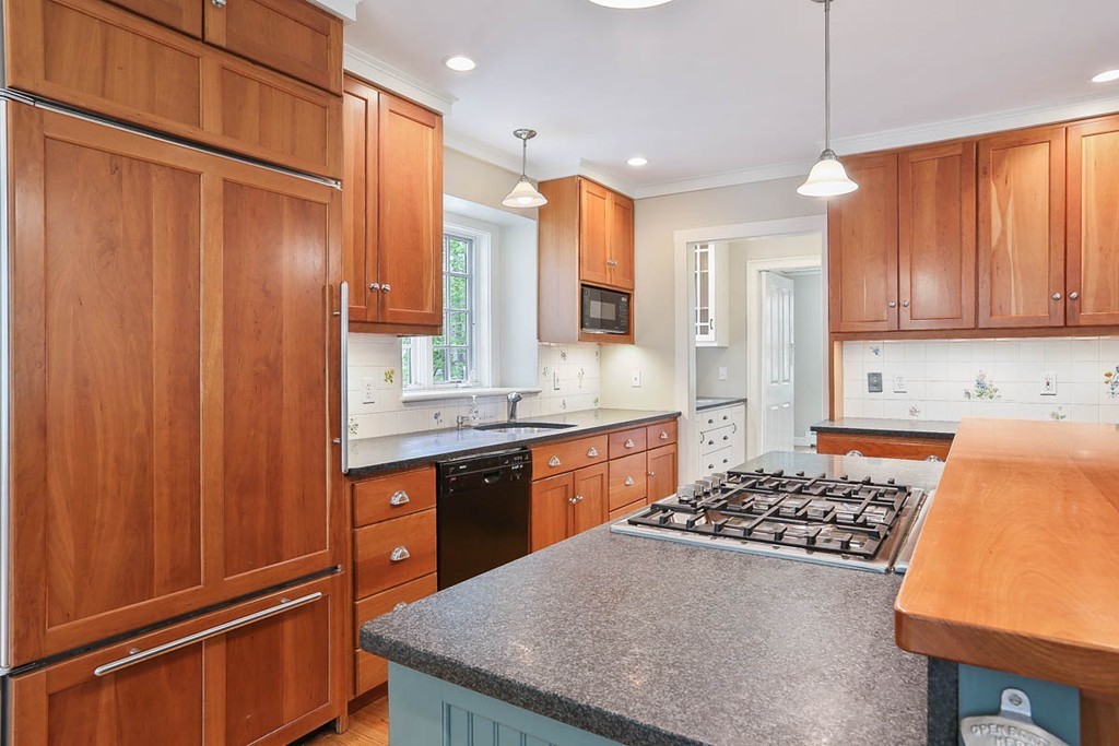 10 Woodside Road Topsfield, MA 01983 - Photo 5 of 30 a kitchen with stainless steel appliances granite countertop a sink stove and refrigerator