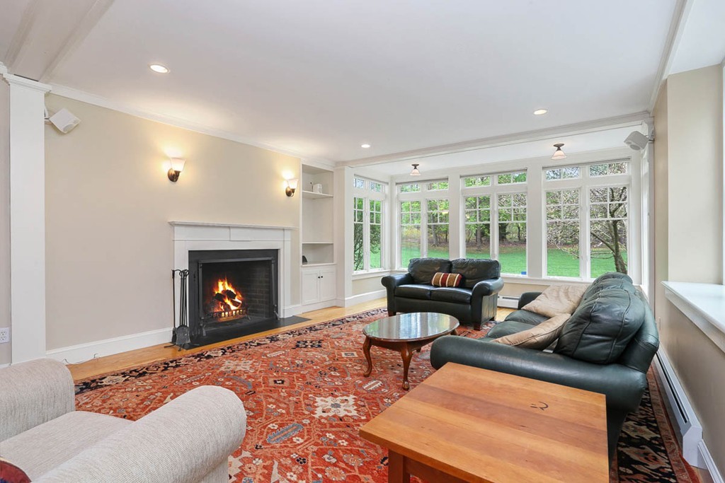 10 Woodside Road Topsfield, MA 01983 - Photo 9 of 30 a living room with furniture and a fireplace