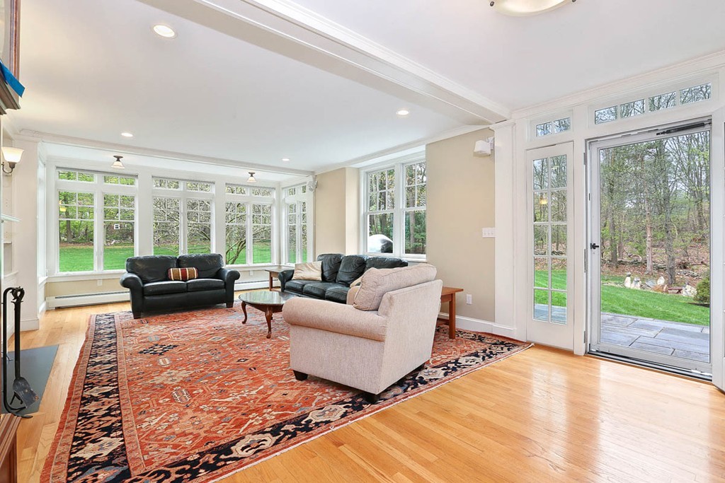 10 Woodside Road Topsfield, MA 01983 - Photo 10 of 30 a living room with furniture and large windows