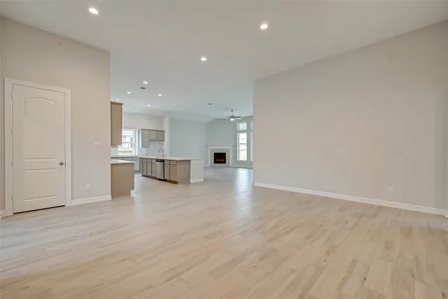 a view of kitchen with wooden floor