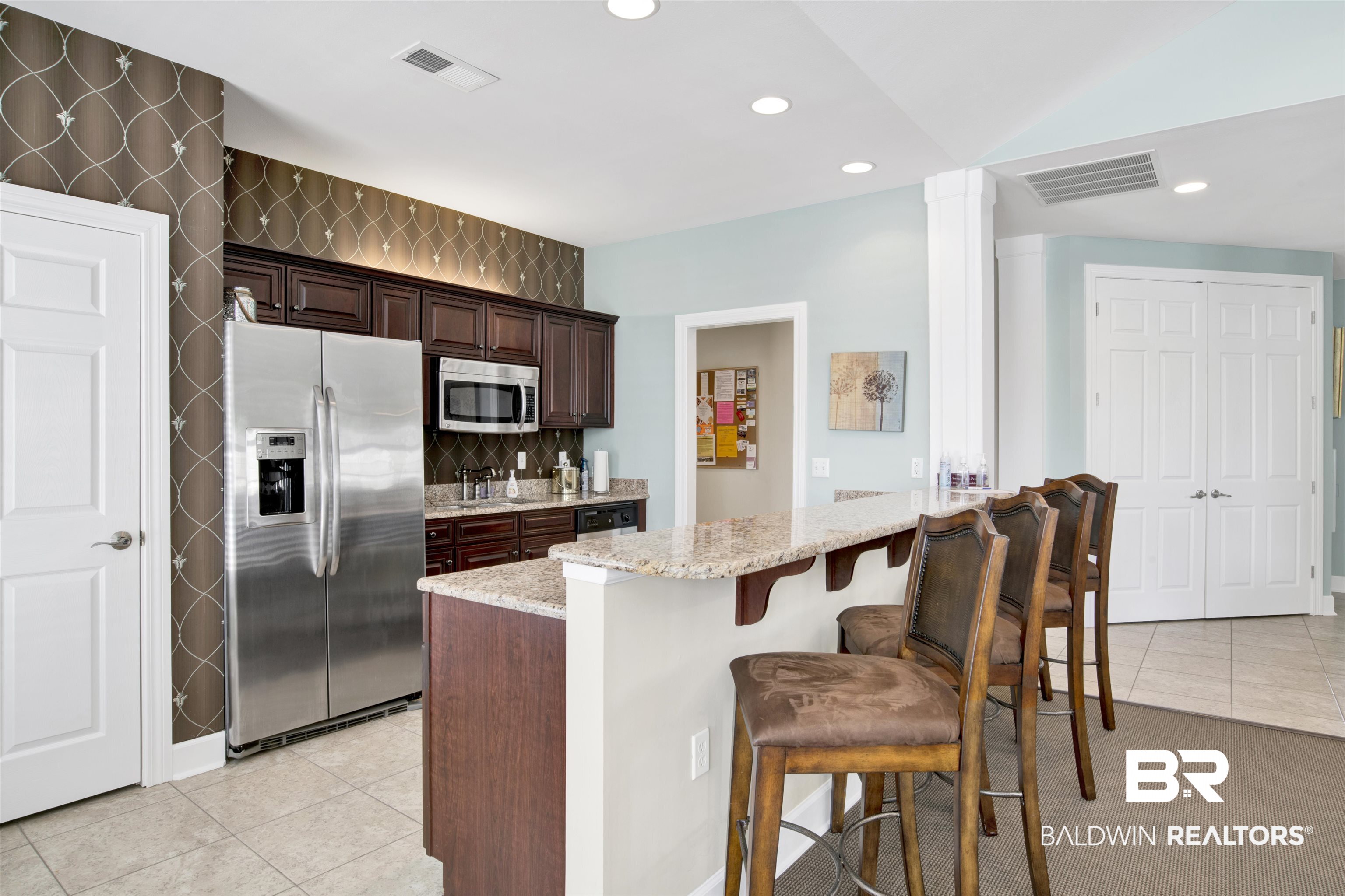 1303 Holmes Avenue, Unit 1303 Foley, AL 36535 - Photo 29 of 34 Clubhouse Kitchen