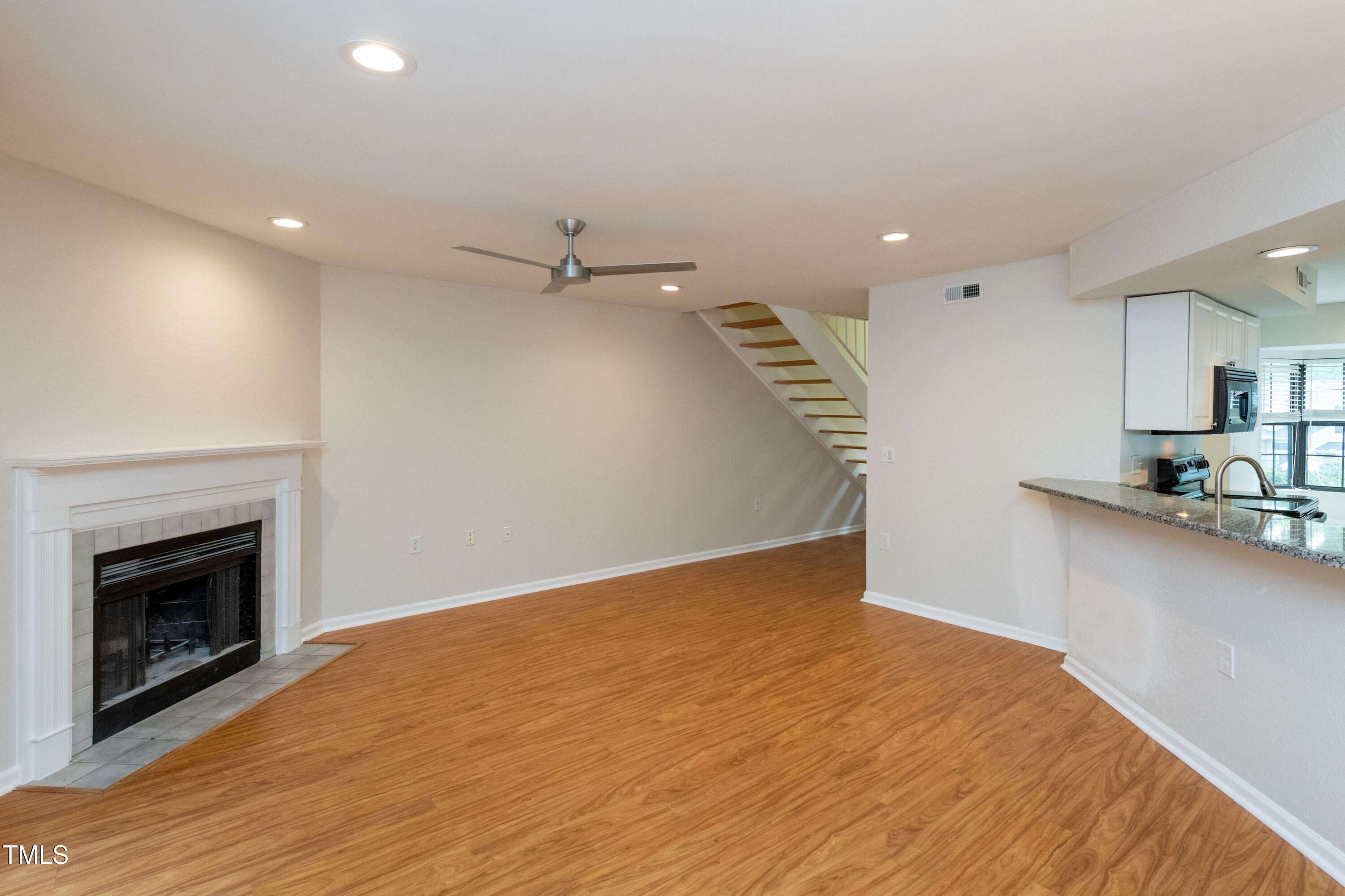 2434 Condor Court Raleigh, NC 27615 - Photo 12 of 21 a view of a livingroom with a fireplace