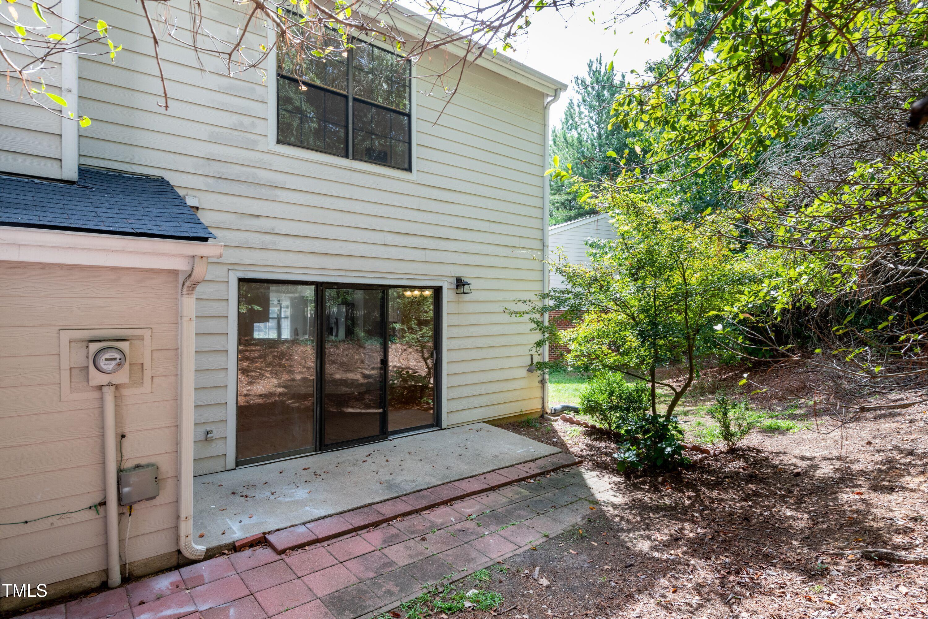 2434 Condor Court Raleigh, NC 27615 - Photo 18 of 21 a view of a front door and a large window