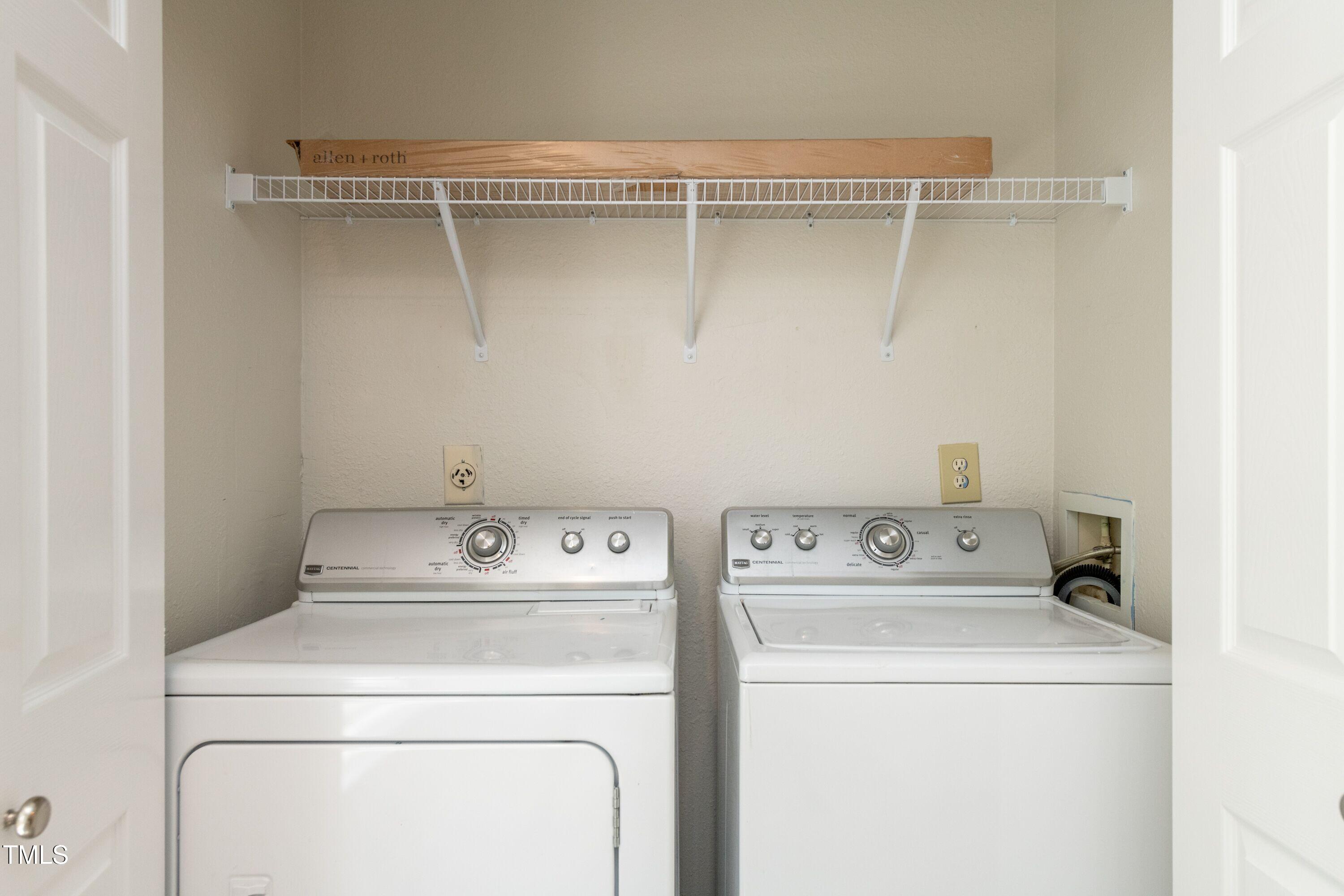 2434 Condor Court Raleigh, NC 27615 - Photo 9 of 21 a utility room with dryer and washer