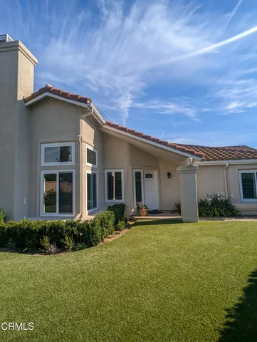 a house view with a garden space