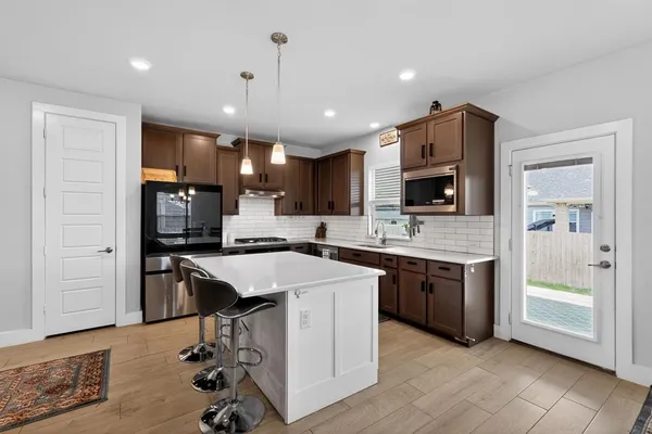 $665,000 | 411 West Harwood Road, Euless, TX 76039