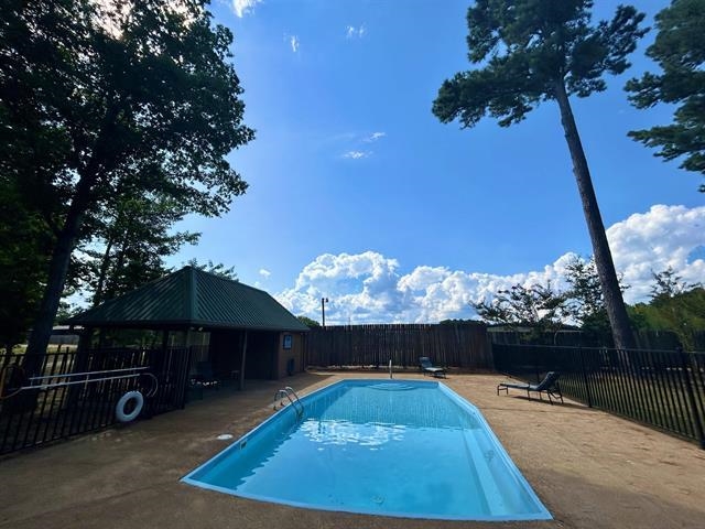 100 Shadow Brook Circle Counce, TN 38326 - Photo 19 of 39 View of swimming pool with patio surround