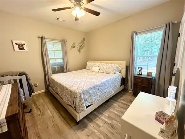 a balcony view with a seating space