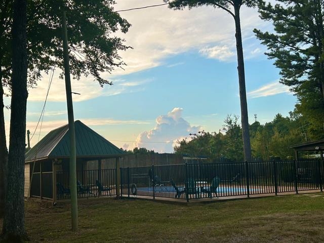 100 Shadow Brook Circle Counce, TN 38326 - Photo 20 of 39 Community pool with a patio area