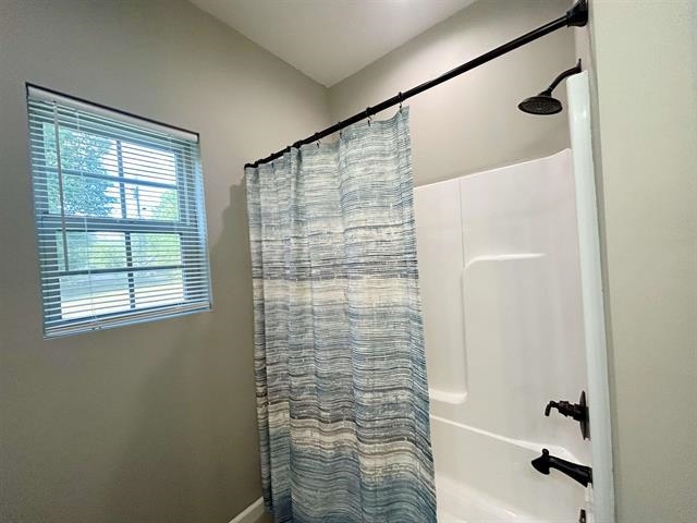 100 Shadow Brook Circle Counce, TN 38326 - Photo 23 of 39 a bathroom with a shower and a sink