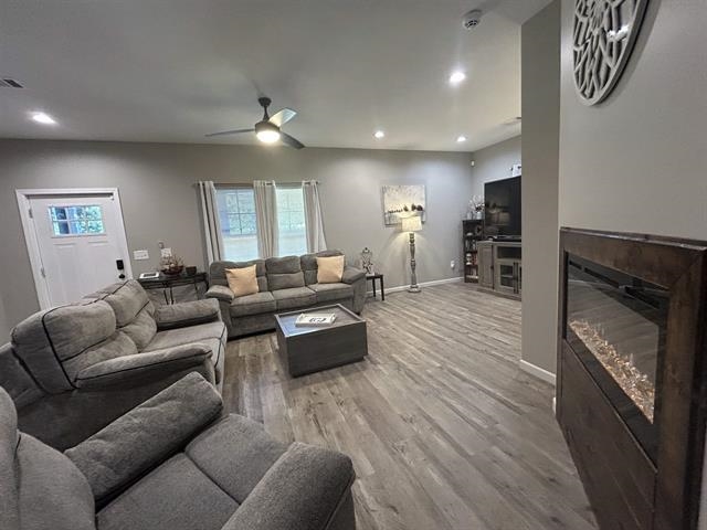 100 Shadow Brook Circle Counce, TN 38326 - Photo 5 of 39 a living room with furniture and a fireplace