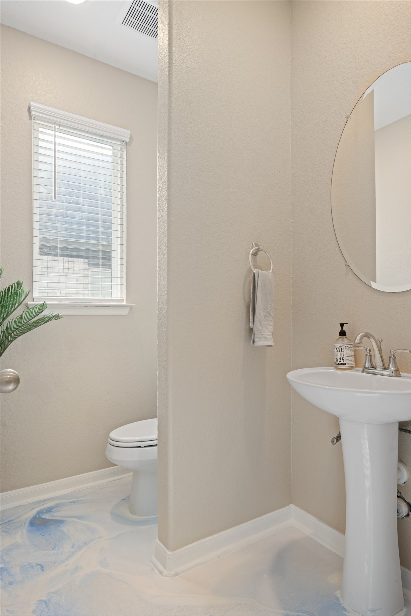 241 Oleander Loop Buda, TX 78610 - Photo 12 of 33 a bathroom with a sink toilet and a mirror