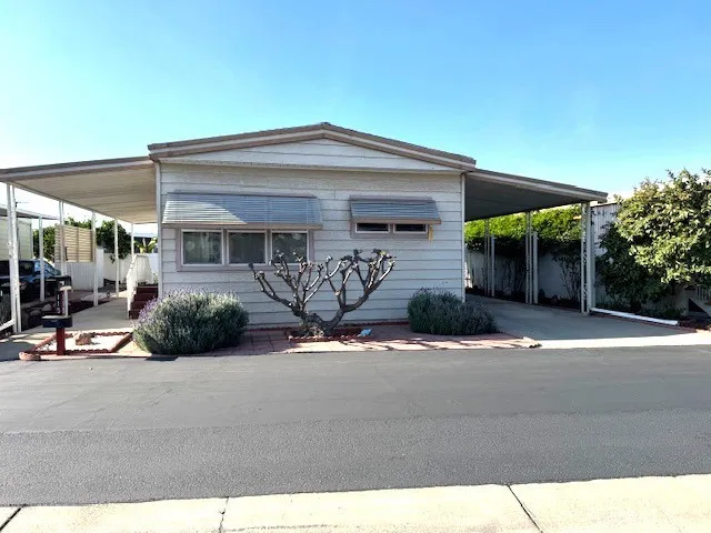 a view of a house with a patio