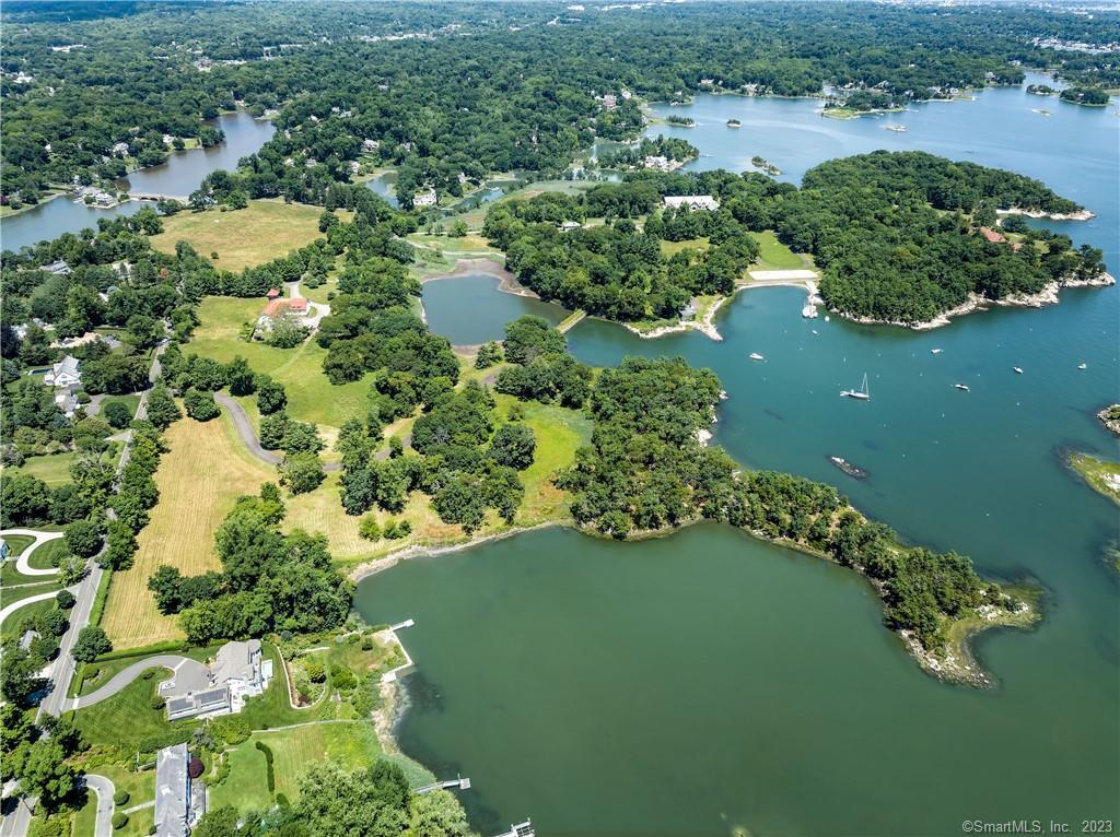 a view of a lake with green space