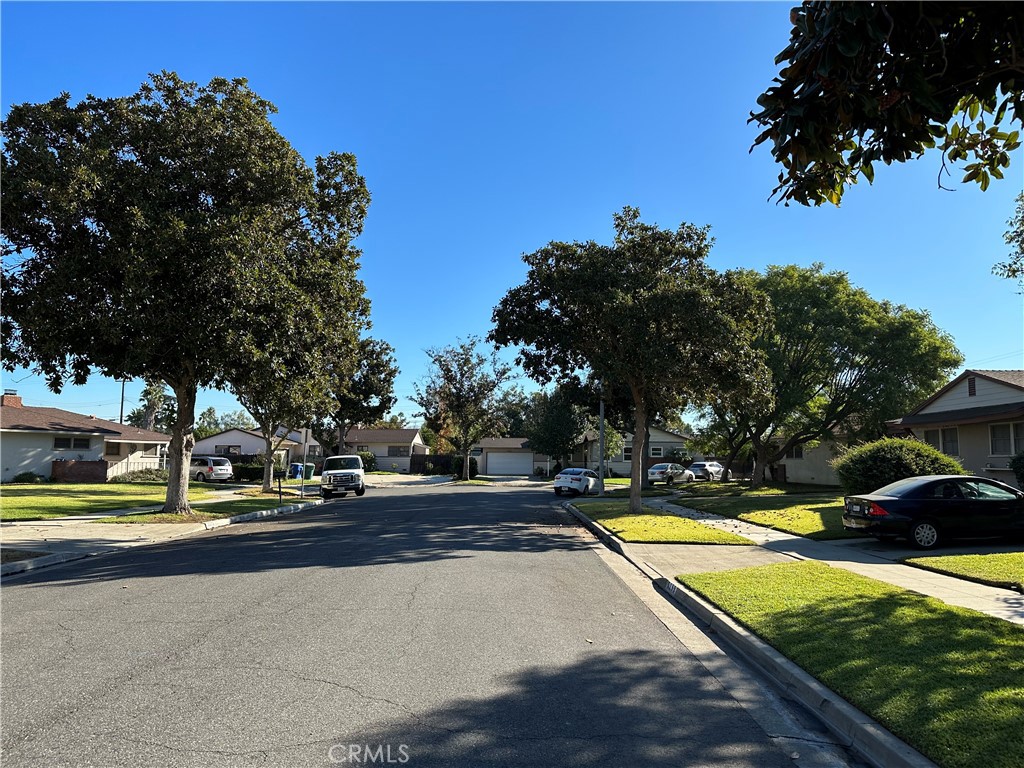 5202 Wroxton Drive Riverside, CA 92504 - Photo 9 of 9 a view of a swimming pool with an outdoor space and seating area