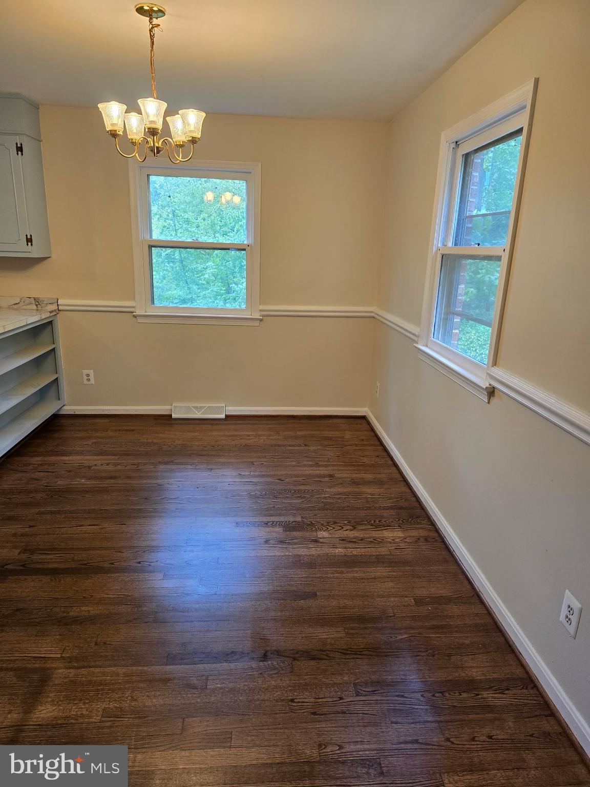 439 Ridgemore Street Fredericksburg, VA 22405 - Photo 4 of 17 wooden floor in an empty room with a window