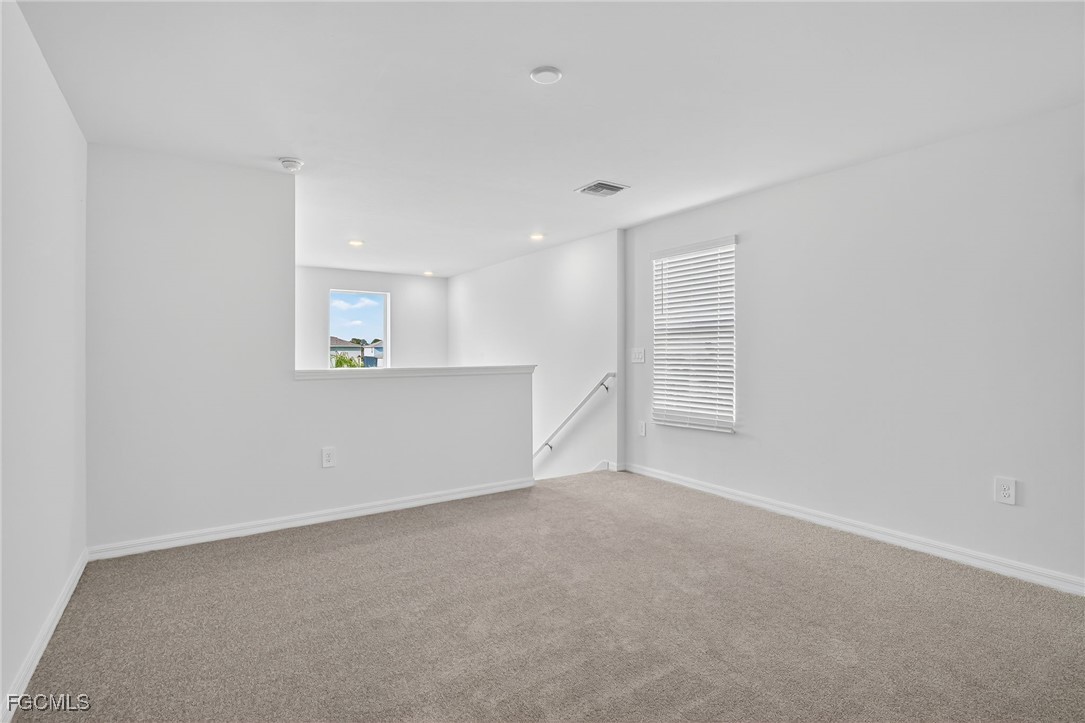 19778 Garden Ridge Lehigh Acres, FL 33936 - Photo 11 of 31 an empty room with windows