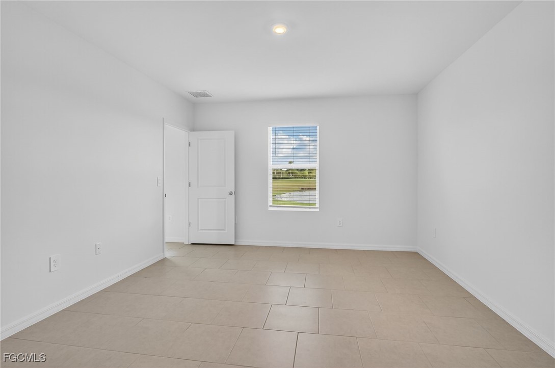 19778 Garden Ridge Lehigh Acres, FL 33936 - Photo 15 of 31 an empty room with windows