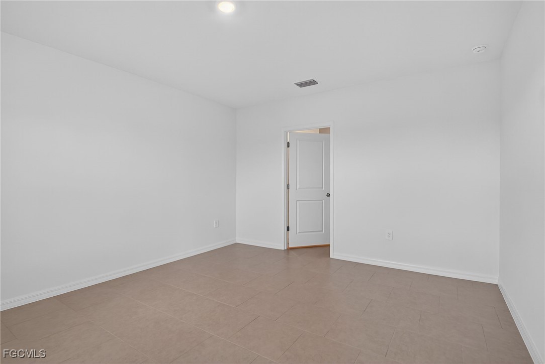 19778 Garden Ridge Lehigh Acres, FL 33936 - Photo 16 of 31 a view of an empty room